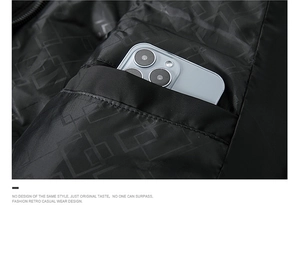 Detail of inner vest pocket with geometric pattern, showing smartphone storage capacity