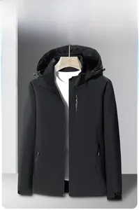 Detail view of black windbreaker jacket featuring waterproof zippers and adjustable cuffs