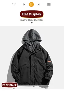 Detail shot of black casual hooded jacket with orange brand patch and drawstring hood