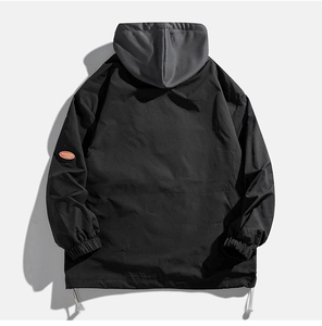 Detail view of windproof jacket with elastic cuffs and adjustable drawstring hem