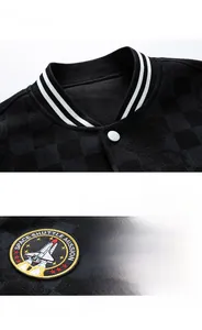 Detail of black bomber jacket featuring rib-knit collar and space mission embroidery