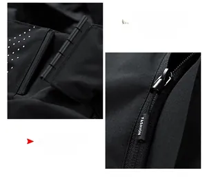 Detail view of windproof high neck collar and branded zipper pull on black jacket