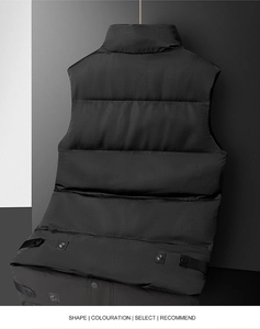 Detail view of the quilted back and adjustable metallic hem tabs on the black vest