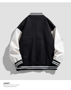 Rear view of retro baseball jacket with black wool body and white faux leather sleeves