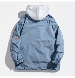 Rear view of casual blue and white color-block hooded jacket with orange sleeve patch