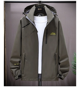 Detail of army green outdoor jacket featuring adjustable velcro cuffs and embroidered logos