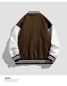 Rear view of a retro functional baseball jacket featuring brown body and white leather sleeves