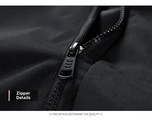 Macro shot of durable metal zipper hardware on black Oxford fabric outdoor jacket