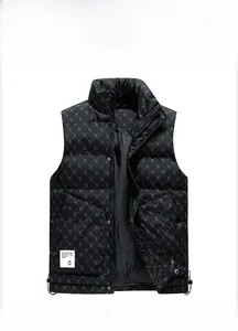 Detail of black quilted puffer vest featuring all-over B-letter print and white logo patch