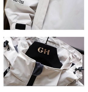 Detail view of WEI-TEX waterproof fabric on men outdoor jacket with adjustable cuffs