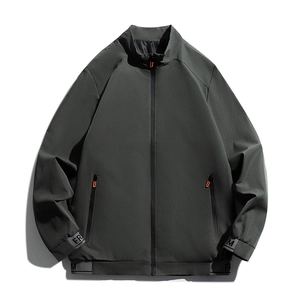 Men's dark grey stand collar jacket with orange zipper accents and windproof fabric