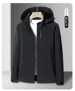 Detail of black women's outdoor windbreaker jacket with hooded design and logo