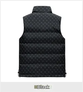 Detail view of the black puffer vest featuring all-over B-pattern print and adjustable hem