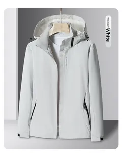 Detail view of women's white outdoor hooded jacket with adjustable cuffs and zippers