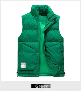 Detail of green stand-collar puffer vest with letter B monogram print and utility pocket