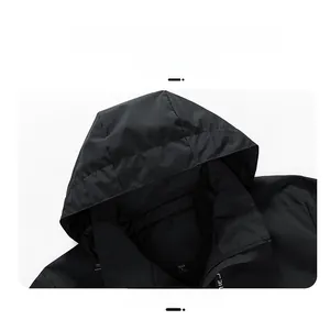 Detail view showing a black jacket featuring a practical detachable hood design