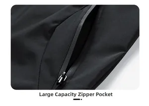 Detail view of large capacity pocket with waterproof zipper on black outdoor jacket