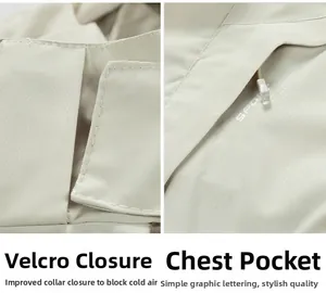 Details der beigen Outdoorjacke mit Klettverschluss am Kragen und Brusttasche mit Reißverschluss