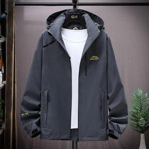 Deep grey hooded outdoor jacket with mountain embroidery and waterproof performance