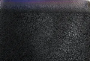 Detail of premium black PU leather texture with high-quality stitching and tailoring