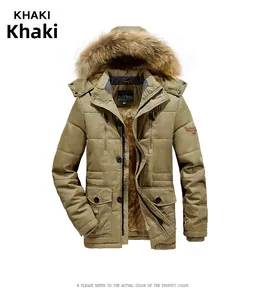 Detail view of khaki winter parka with thick faux fur lining and warm fluffy collar hood