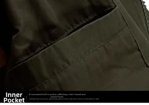 Detail view of the inner pocket on a dark green olive flight jacket for men