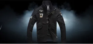 Detail of embroidered badges and ribbed collar on black military style bomber jacket