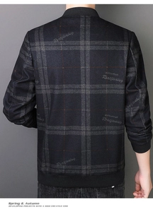 Detail of navy blue plaid jacket showing back print design and ribbed hem texture