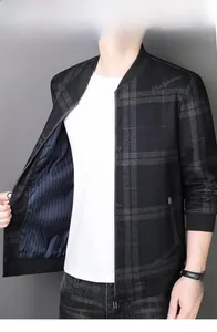 Detail of classic stand collar and plaid pattern on men's business casual jacket