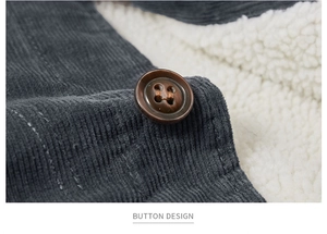Detail of navy corduroy jacket with brown button design and white warm sherpa lining