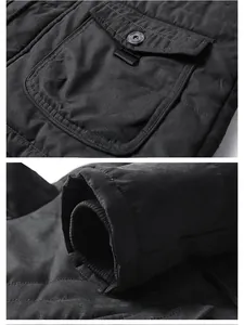 Close-up of windproof cuffs and buttoned chest pockets on men winter cotton jacket