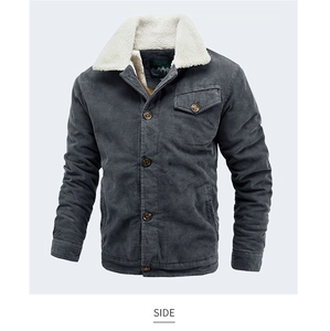 Detail of dark grey corduroy jacket featuring white faux fur collar and flap chest pocket