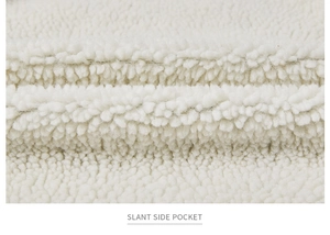 Close-up of premium lamb wool lining and the functional slant side pocket of the jacket