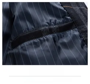 Detail shot of the inner pocket with smooth binding and striped lining of the jacket