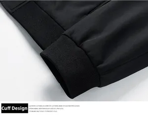 Detail view of the ribbed cuff design on a black men's jacket for windproof protection