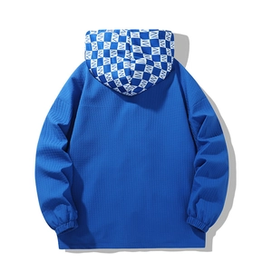 Oversized Klein blue waffle knit hoodie with plaid pattern hood from a back view