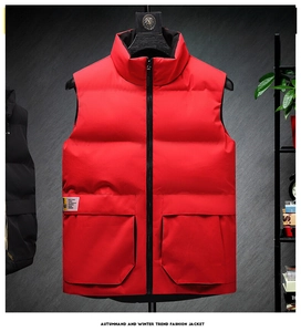 Detail of red stand collar vest featuring quilted design and large flap utility pockets