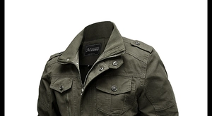 Detailed view of army green cotton jacket featuring military epaulettes and chest pockets
