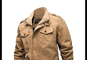 Detail of khaki cotton workwear jacket with military shoulder tabs and dual front pockets