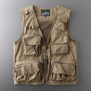 Detail of khaki tactical vest featuring functional multi-pockets and breathable mesh lining
