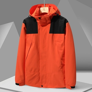Veste outdoor imperméable orange avec capuche et empiècements noirs pour hommes et femmes