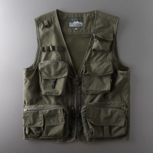 Detail of olive green tactical vest showing breathable mesh lining and durable nylon fabric