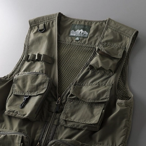 Detail of olive green tactical vest showing mesh lining and interior size label M