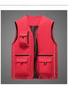 Detail of red utility vest showing breathable black mesh lining and functional pockets