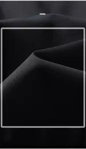 Close-up of durable, breathable black fabric with high-density weave for men's jackets