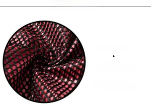 Detailed macro view of the breathable red and black mesh lining on the fishing vest