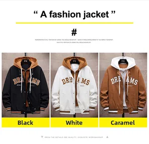 Detail view of baseball jackets in black, white, and caramel with DREAMS embroidery