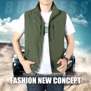 Detail of army green quick-dry vest showing multi-pocket design and standing collar