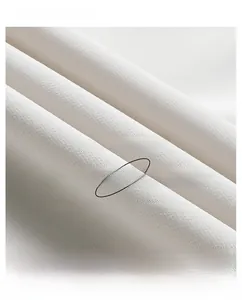 Close-up of soft beige coral velvet lining showing breathable knit fabric texture
