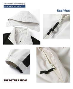 Detail view of hooded jacket features including zipper pockets and elastic cuffs